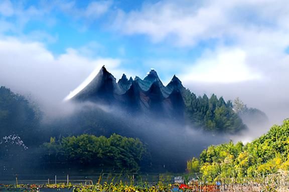 Mountain range with mist around