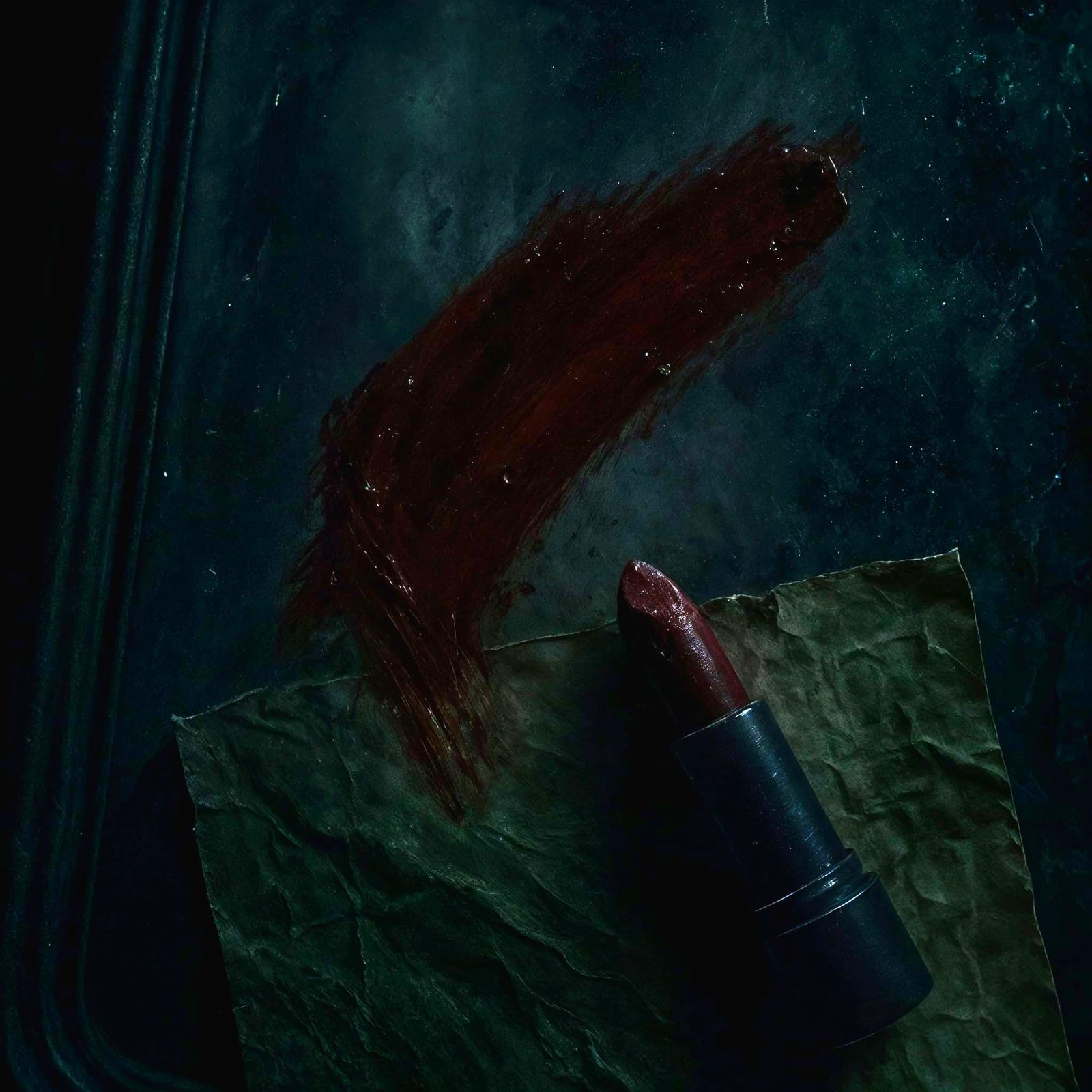 Intense Red Lipstick Smear on Fogged Mirror