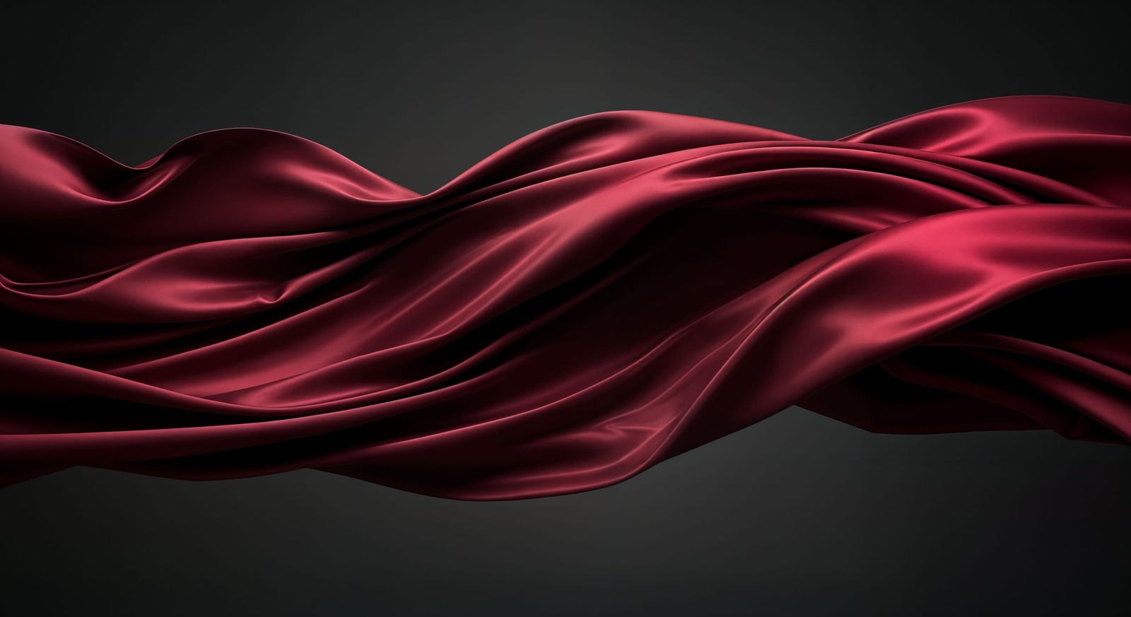 Burgundy Satin Fabric Flowing Against Dark Grey