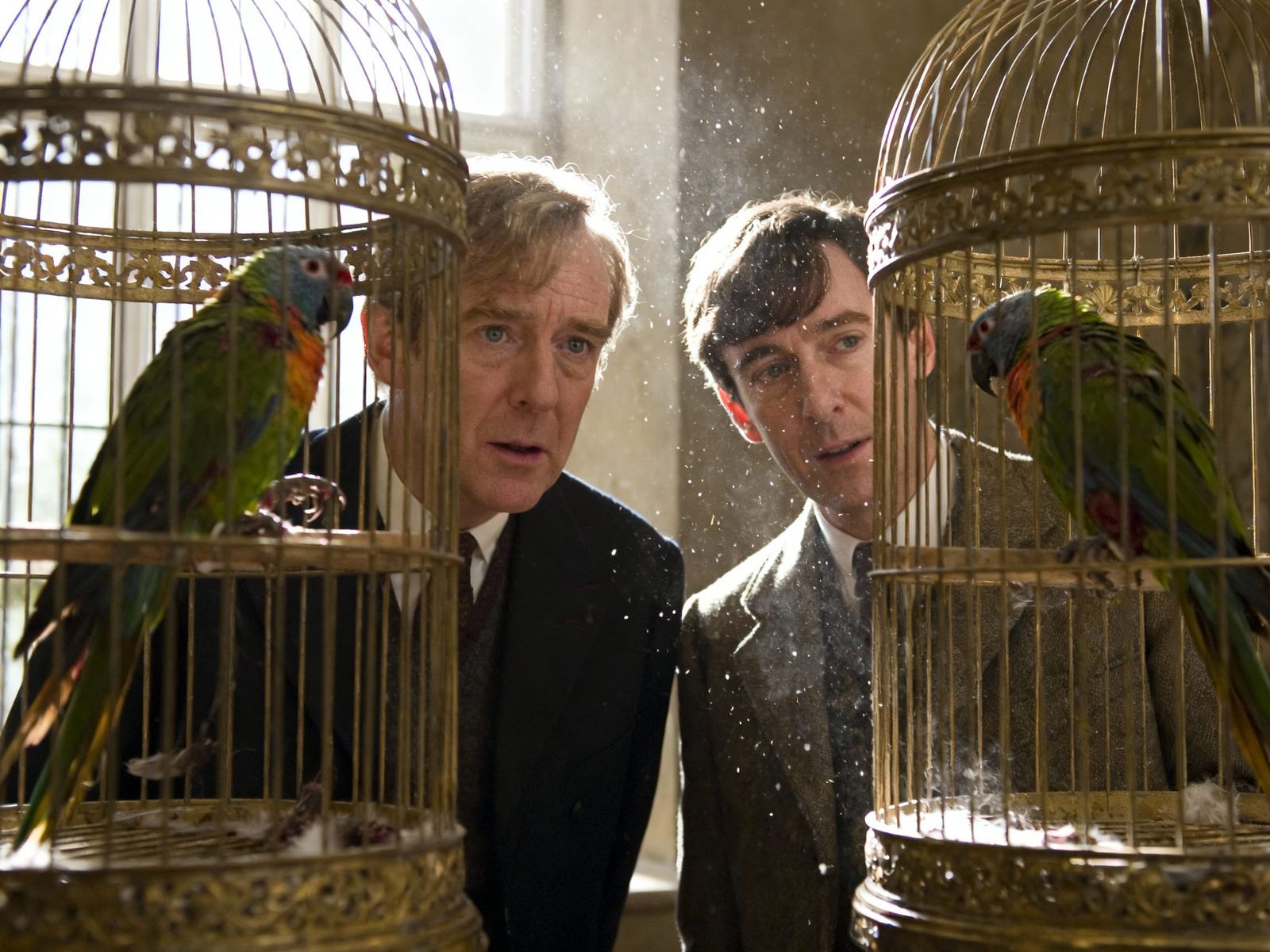 Monty Python Actors with Dead Parrots in Birdcages