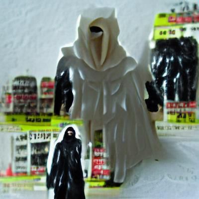 White Masked Hooded Figure in the Dark