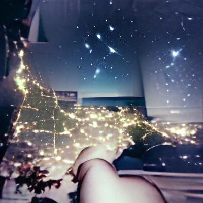 Contemplative Figure Beneath a Starry Expanse