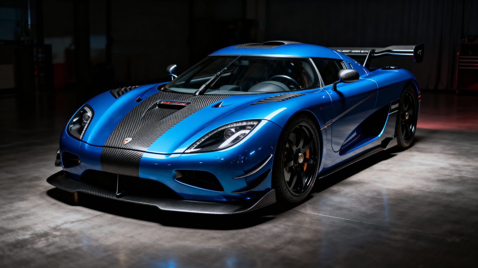 Modified Koenigsegg in Metallic Blue with Carbon Fiber Accen...