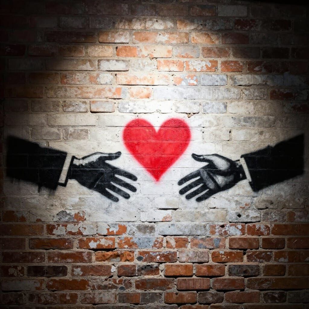 Urban Romance: Stenciled Hands and Heart on Brick