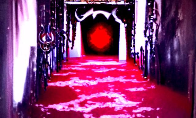 Eldritch Red Eye Stares from Hallway of Chains