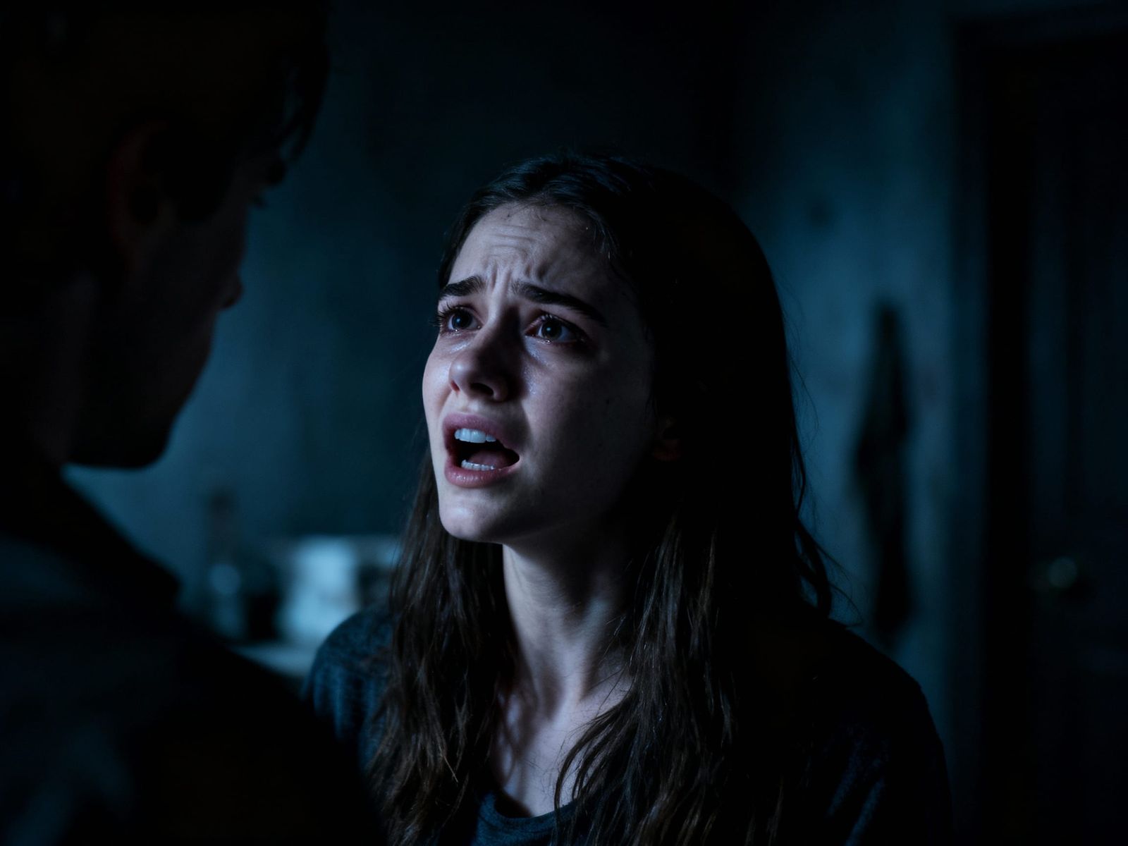 Woman's Desperate Plea in Dramatic Chiaroscuro Lighting