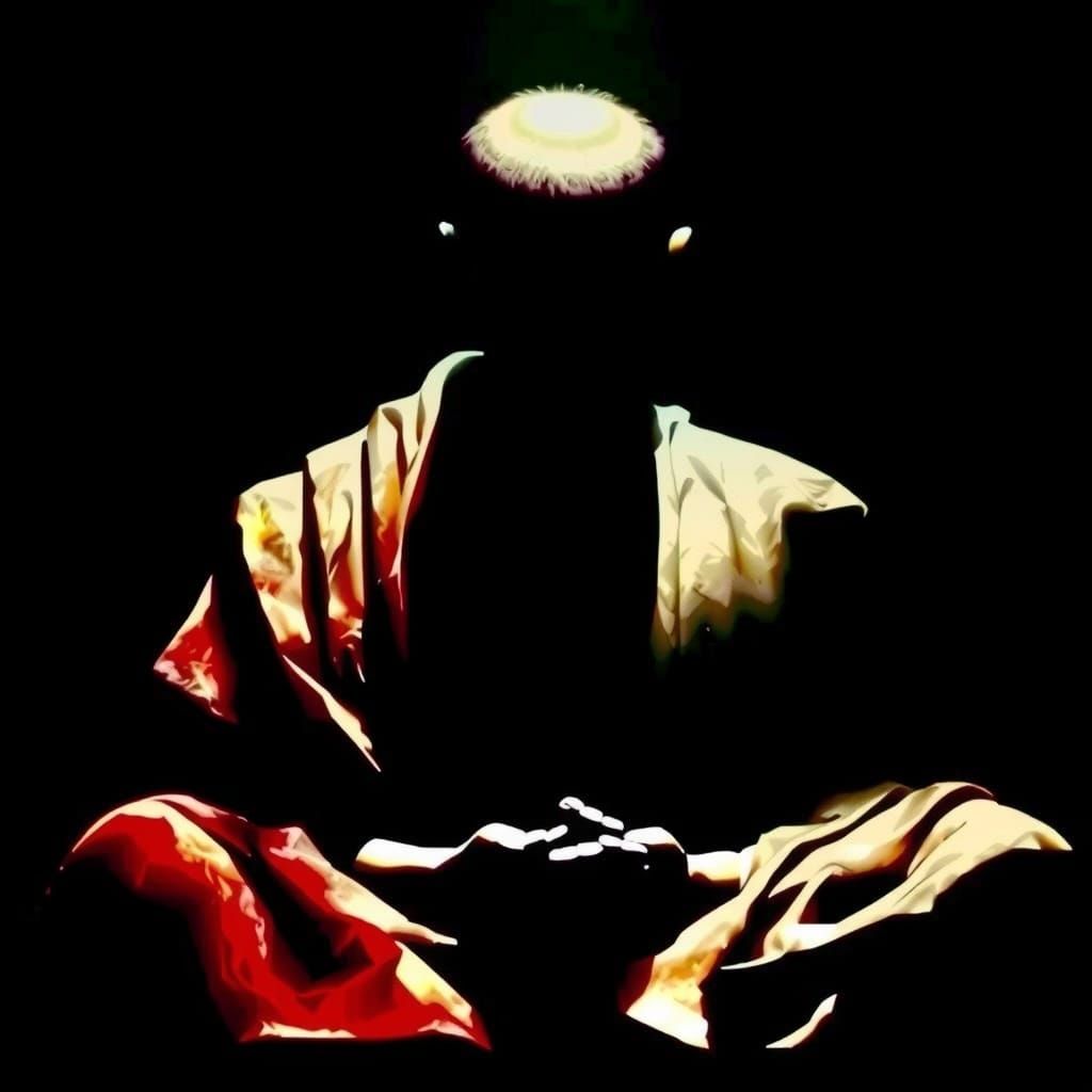 Meditative Buddhist Monk in Darkened Sanctum