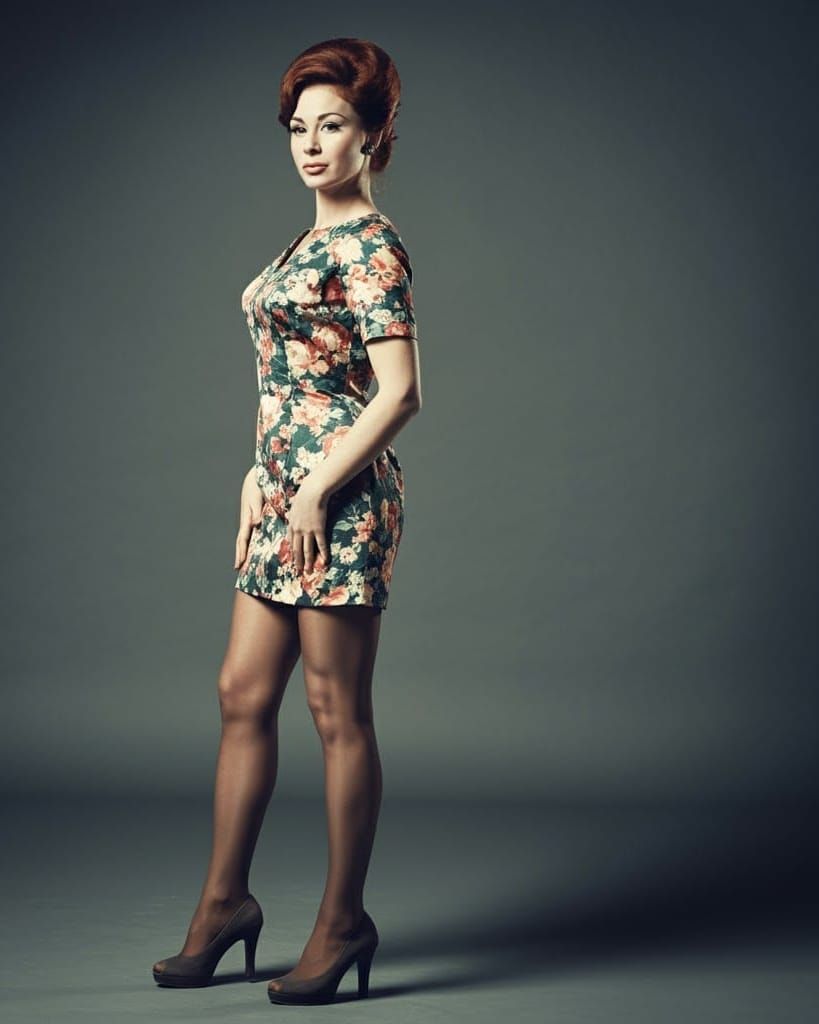 Vintage 1960s Auburn-Haired Woman in Floral Dress