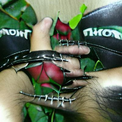 Rose Thorns Piercing Hands: A Dark Bondage Scene
