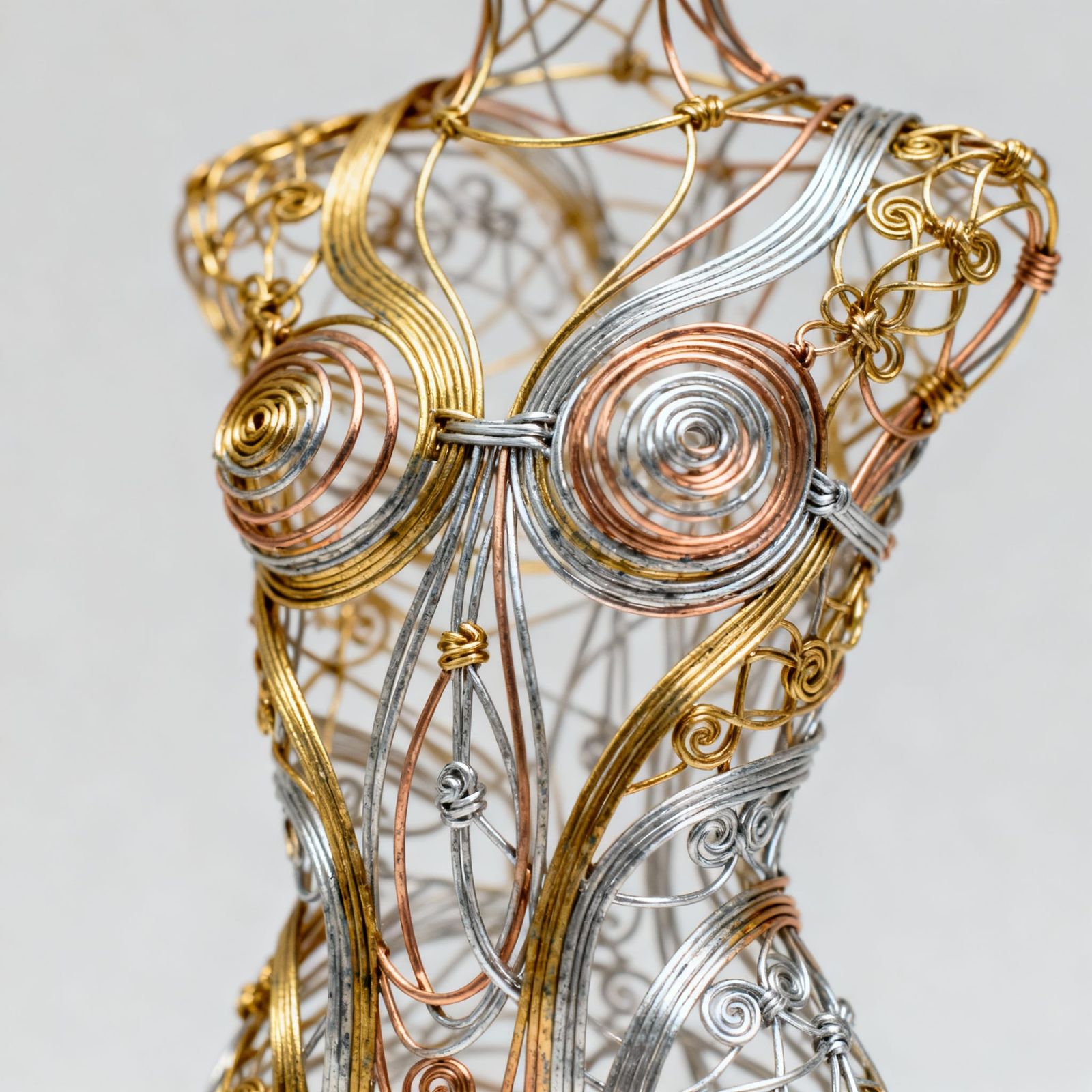 Intricate Wire Sculpture of Hyper Feminine Expression