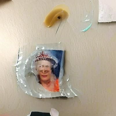 Condom Stuck on Queen Elizabeth II Portrait