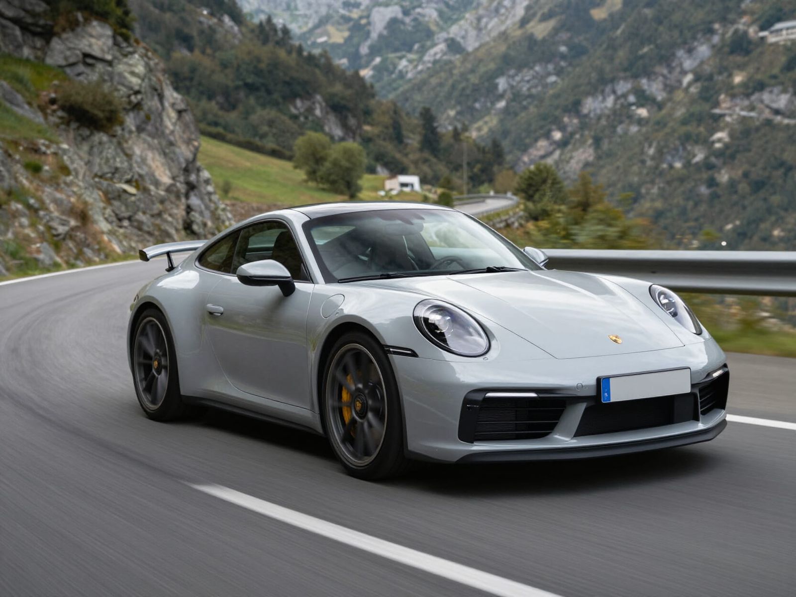 Porsche 911 GT Speeds Down Mountain Road