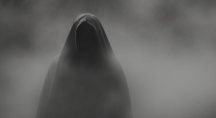 Eerie Figures in Dark Mystical Landscape