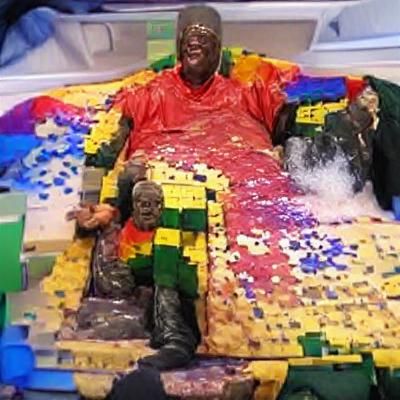 Person Covered in Slime and Lego Bricks