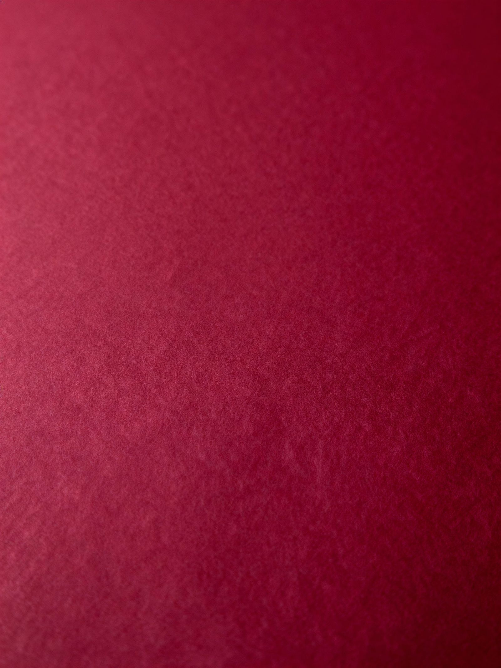 Elegant Wine-Red Background with Refined Sheen