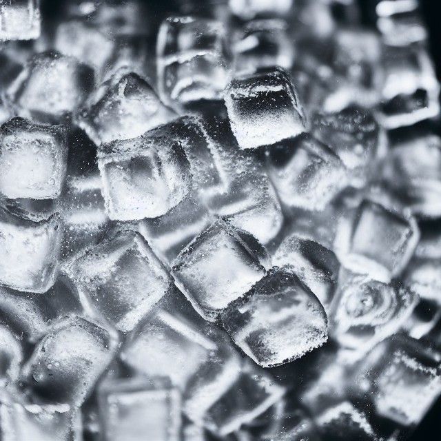 Icy Coca-Cola Close-Up at Night