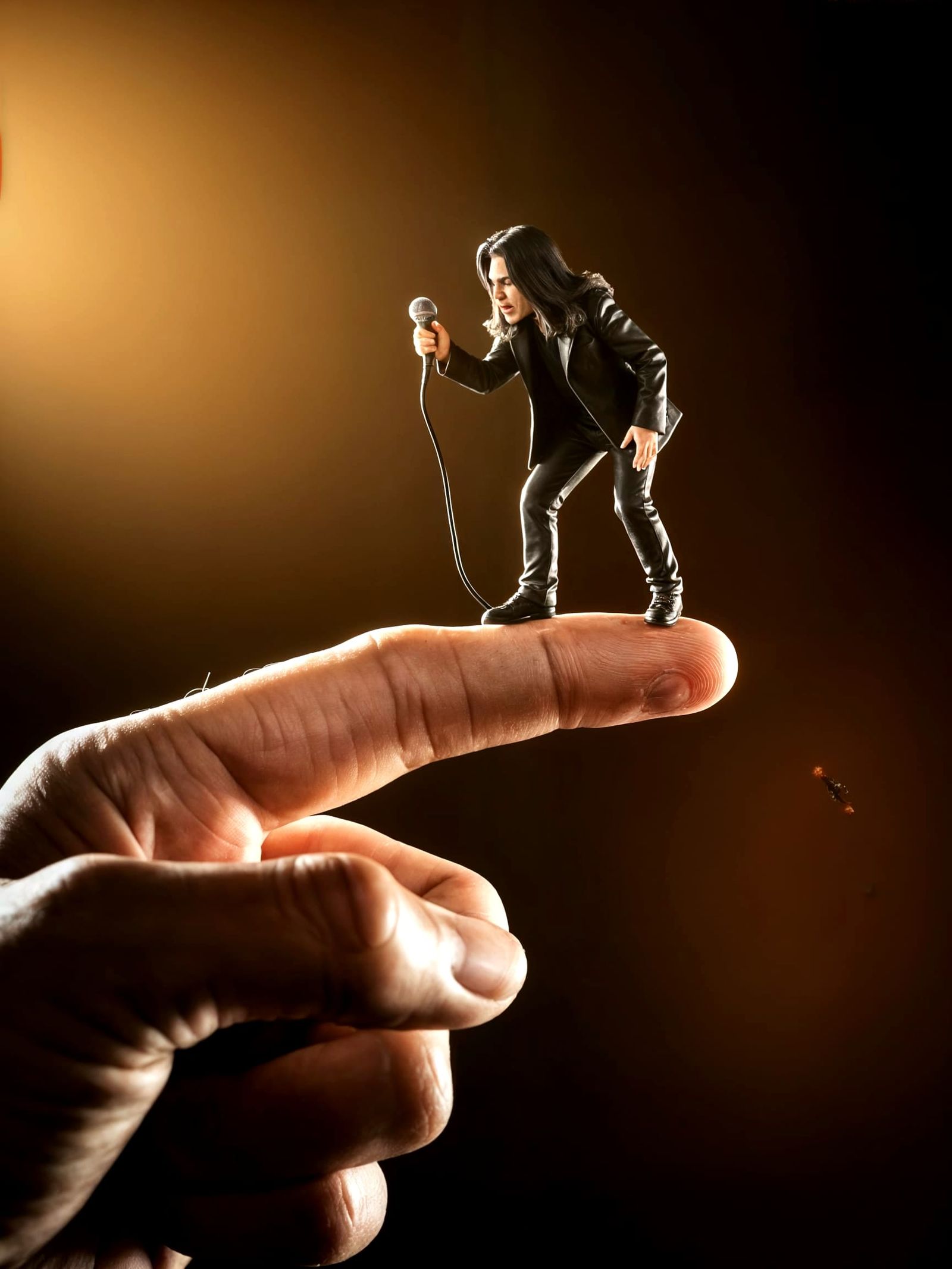 Miniature Ozzy Osbourne Confronts Towering Figure