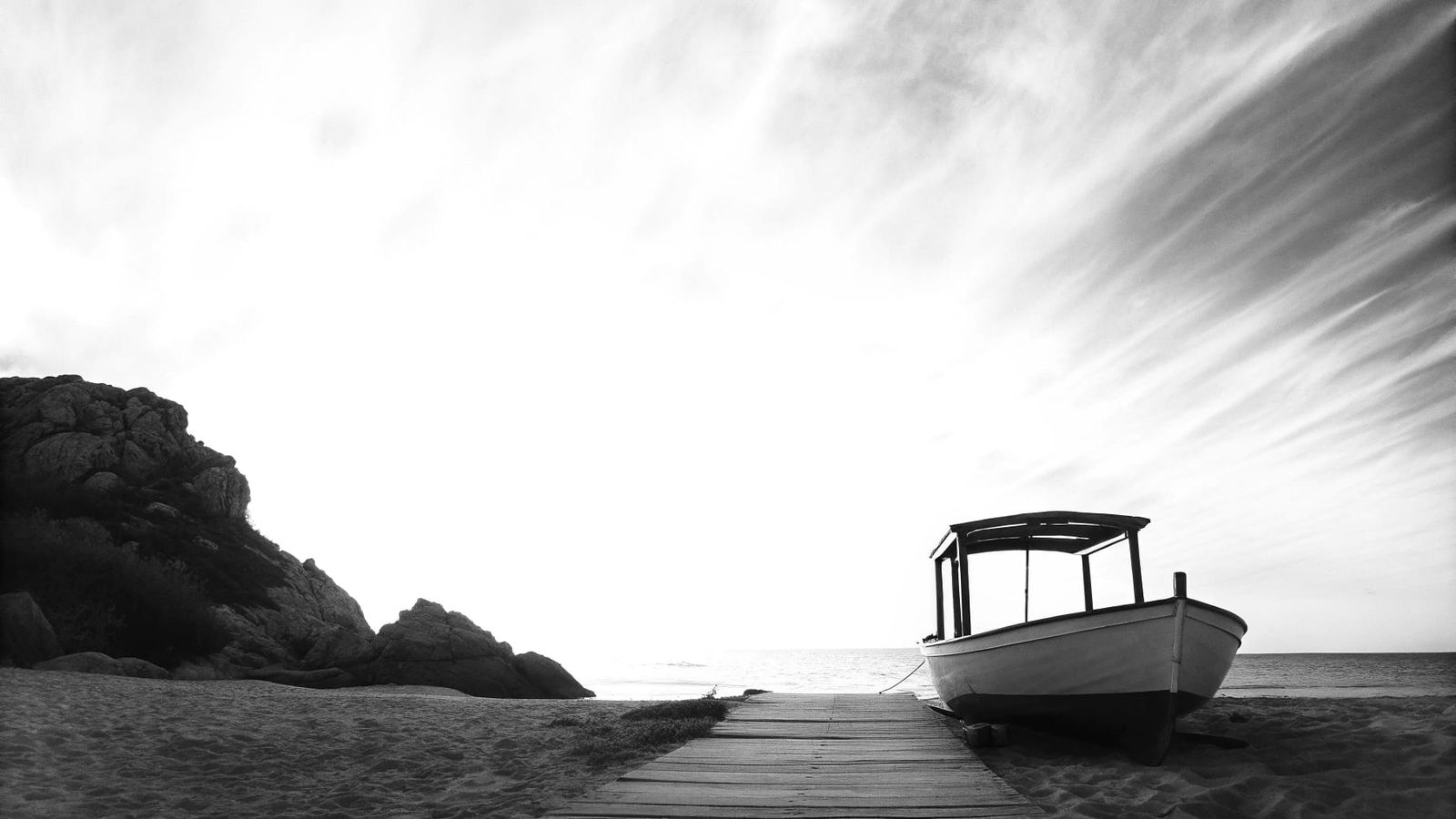 Elegant Black and White Coastal Landscape with Boat and Wood...