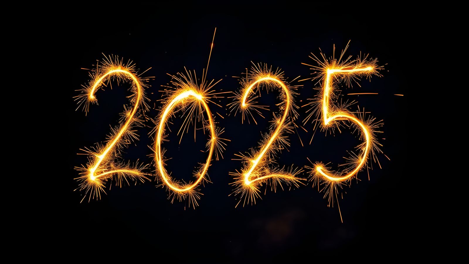 Golden Fireworks Display Over Night Sky