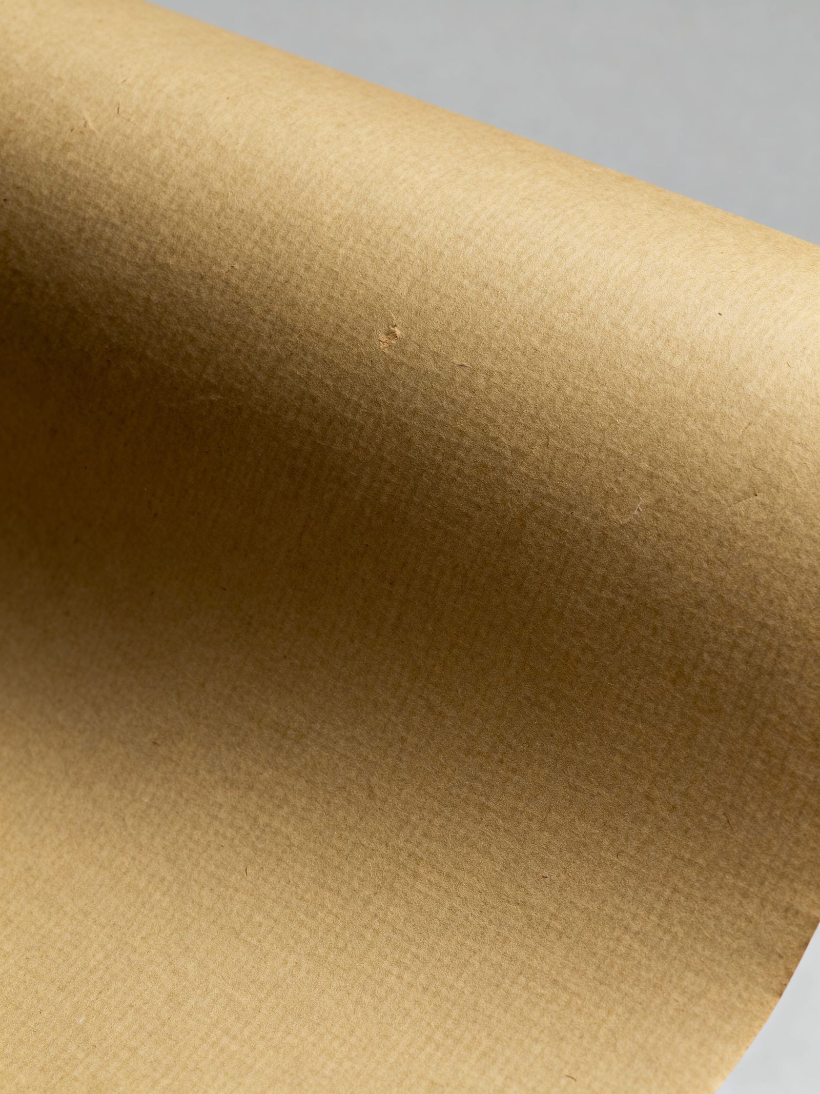 Warm Khaki Paper Texture Evokes British Countryside Calm