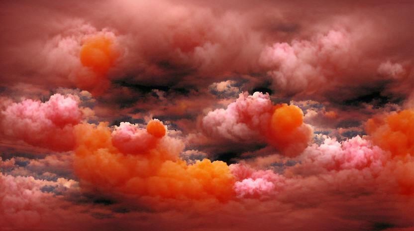 Colorful Clouds in Pink, Orange, and Red Sky