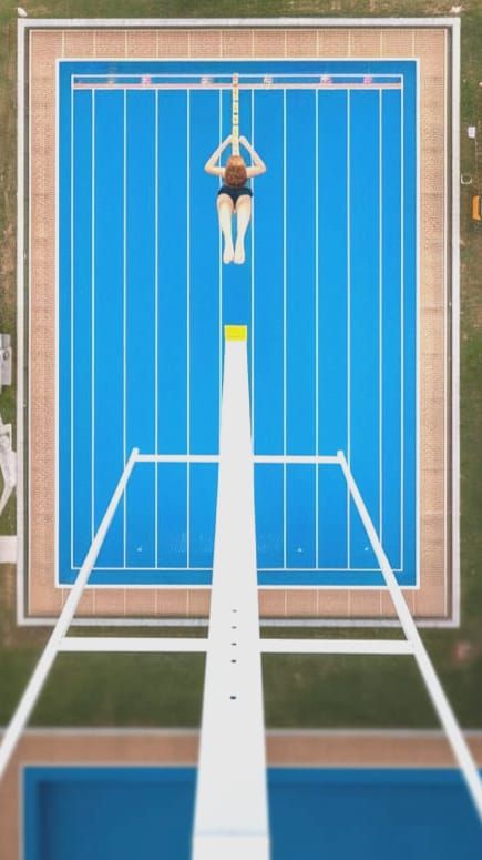 Hyperrealistic Vertigo Inducing High Dive Photograph