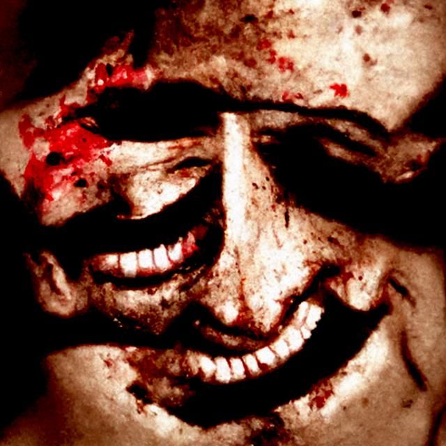 Grinning Bloodied Face: Twisted Pleasure in Realism