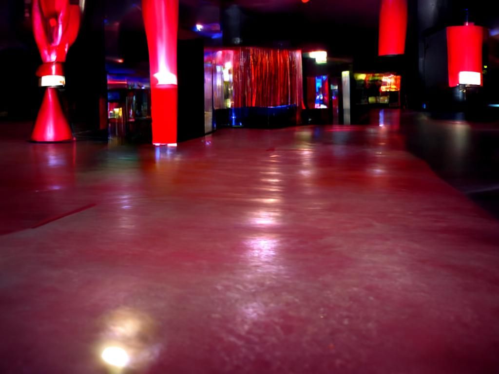 Empty Nightclub Interior with Red Carpet
