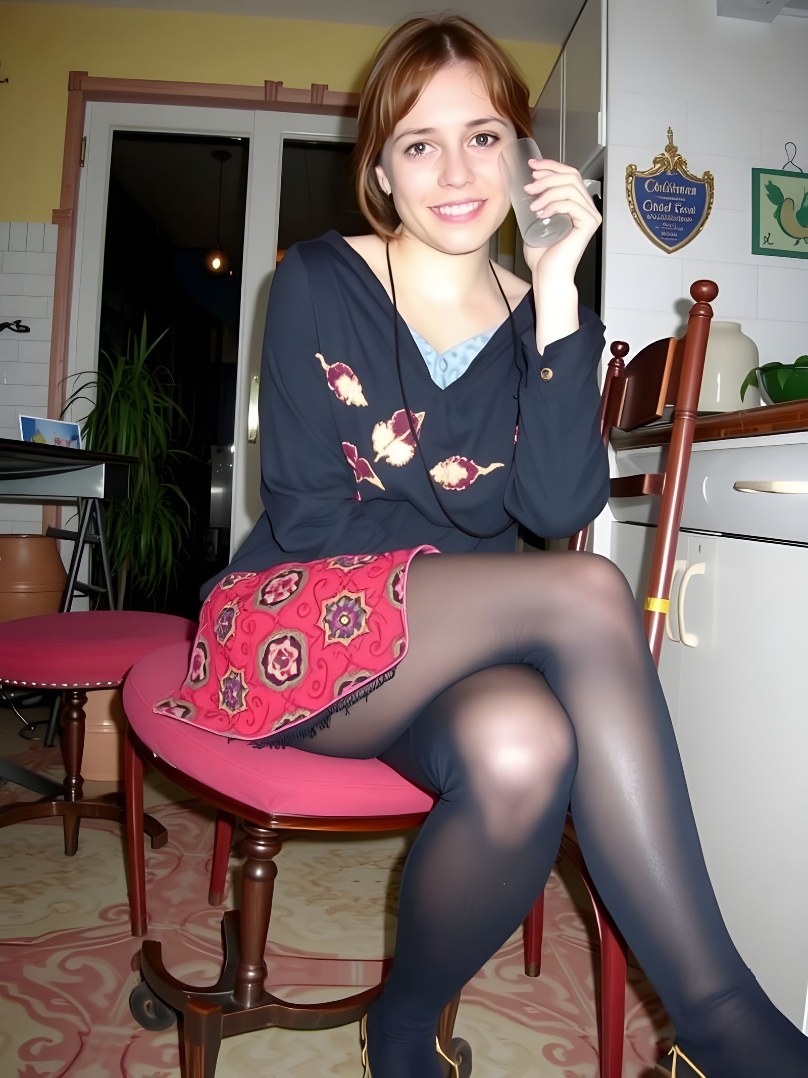 Woman in Paisley Dress in Vintage Kitchen