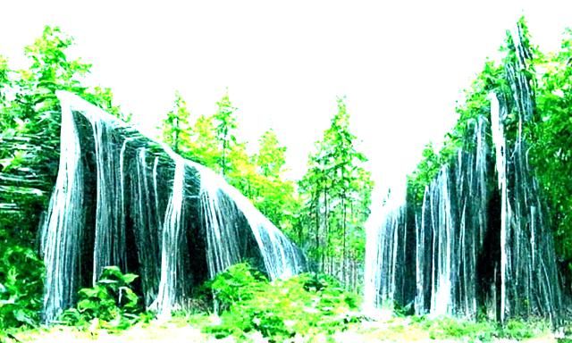 Picturesque Waterfall Scene in Lush Forest