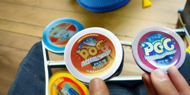 Kids Playing Pogs in Schoolyard Game