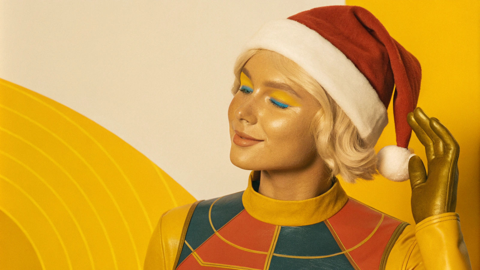 Futuristic Blonde Woman in Santa Hat