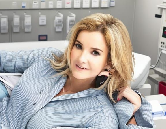 Nude Woman in Hospital Operating Theatre