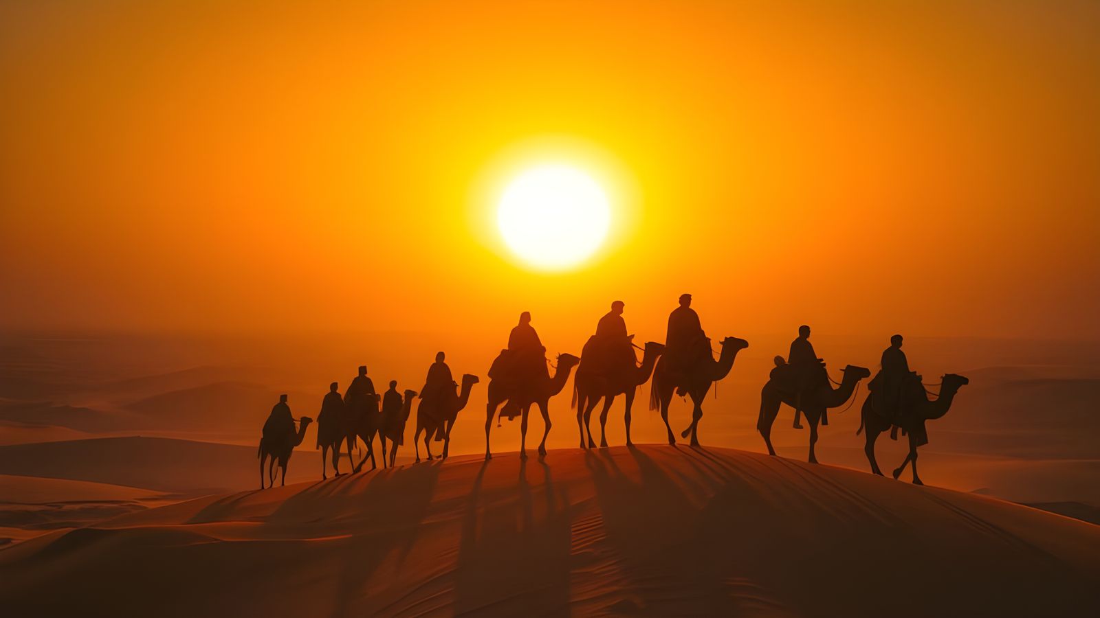 Bedouin Caravan Silhouetted on Desert Dunes