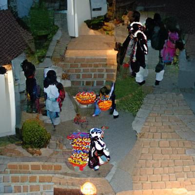 Halloween Night: Children Trick-or-Treating in Costume