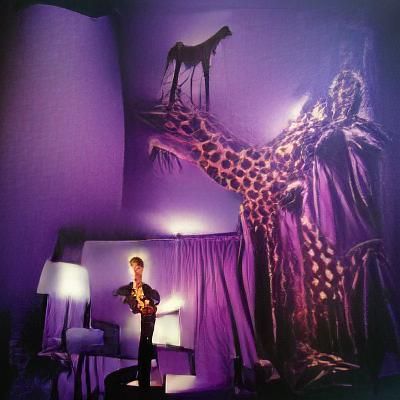 David Bowie in Ethereal Purple Room with Giraffe