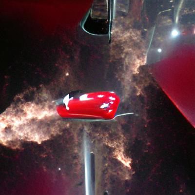 Red Tesla Rocket Car in Deep Space