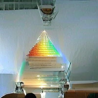 Glass Pyramid Separating Light into Rainbow