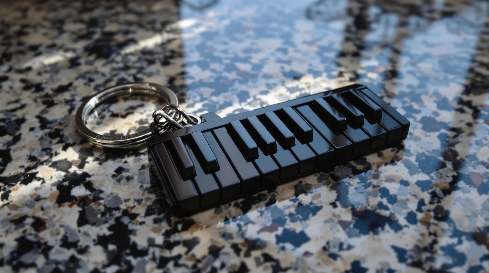 Piano Key Keychain on Kitchen Countertop