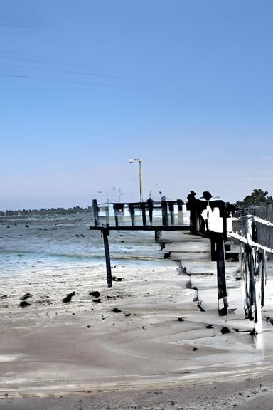 Gothic Film Noir Beach Jetty at Golden Hour