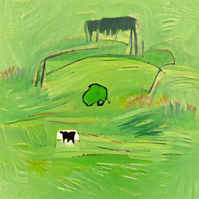 Cow Grazing in Green Pasture