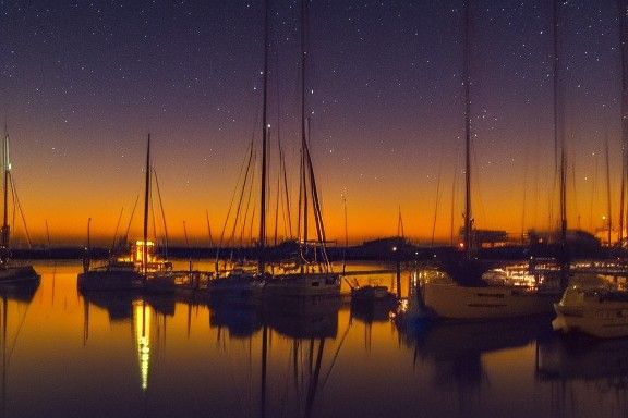 Boats on Water at Night: AI Generated Image