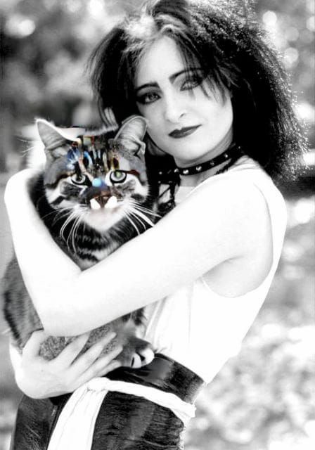 Siouxsie Sioux Portrait Holding Grey Cat