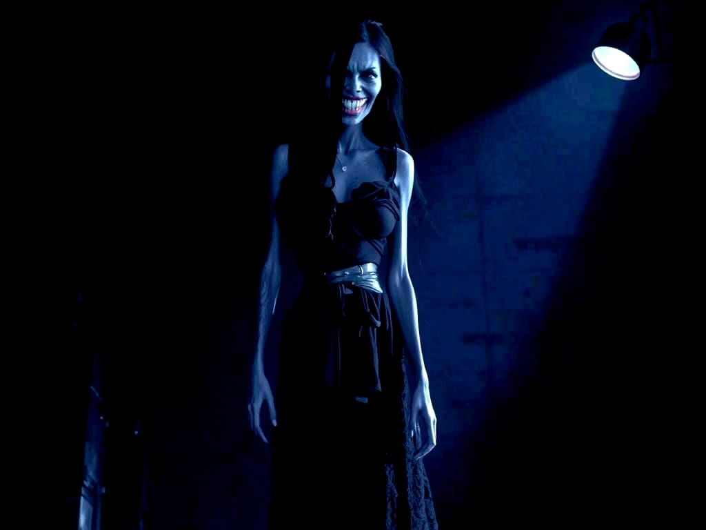 Evil Demon's Twisted Grin from Smile