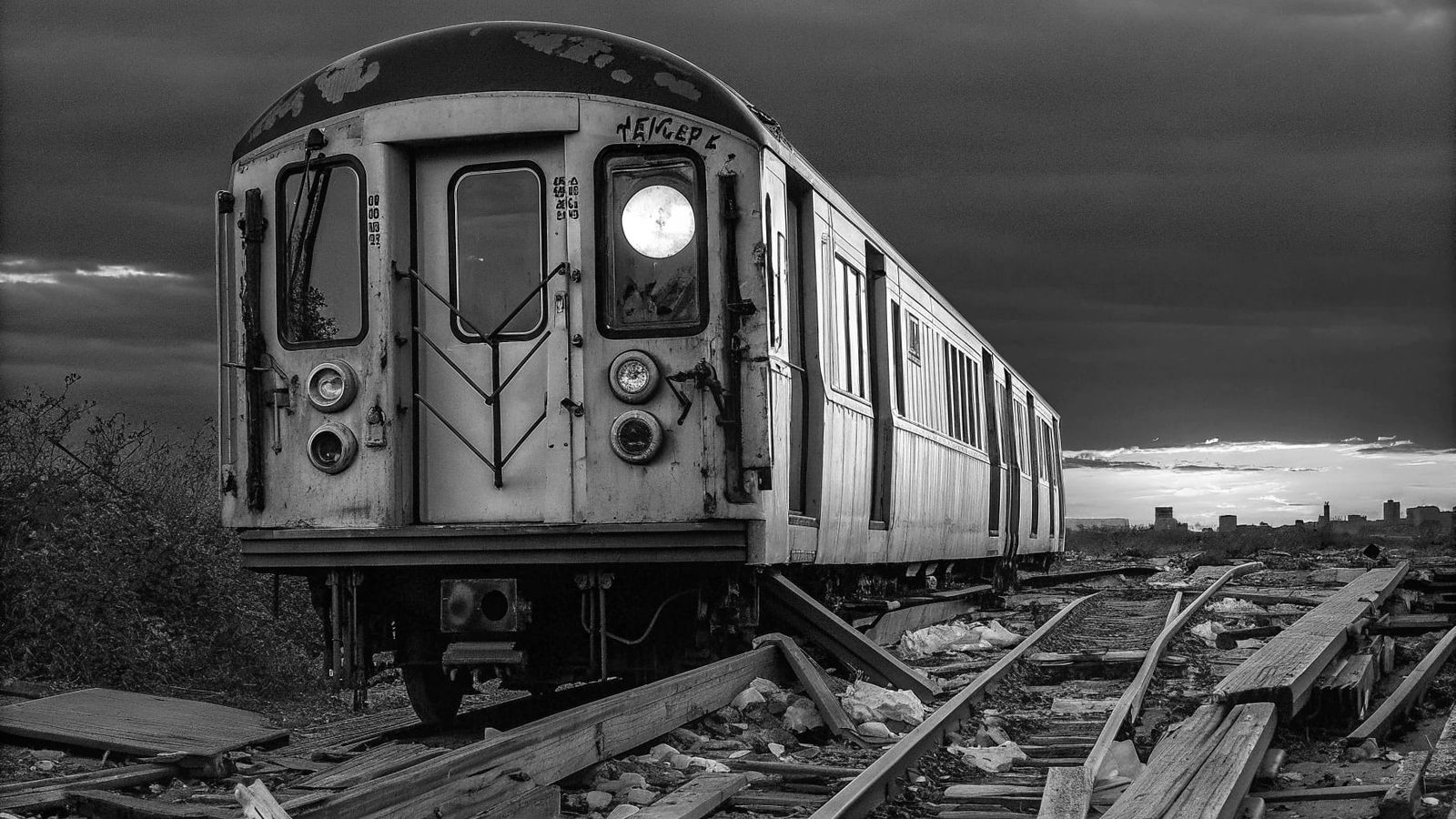 Abandoned Subway Car at Sunset, Covered in Graffiti