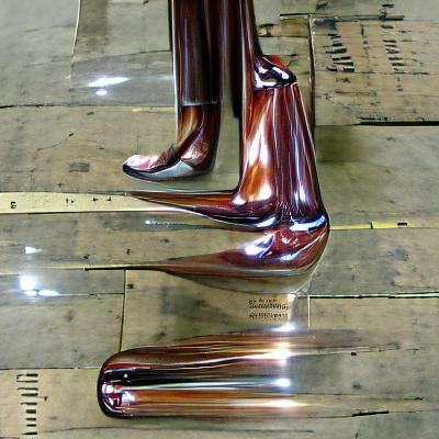 Tall Polished Metallic Figure