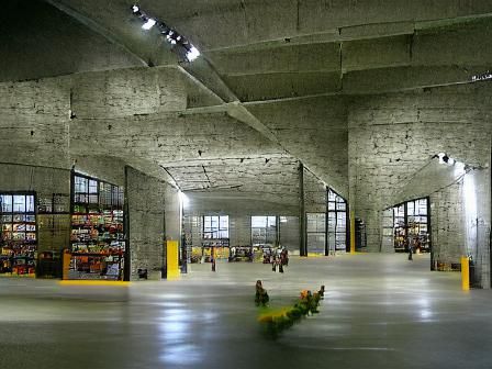 Sprawling Warehouse Interior with Concrete Design