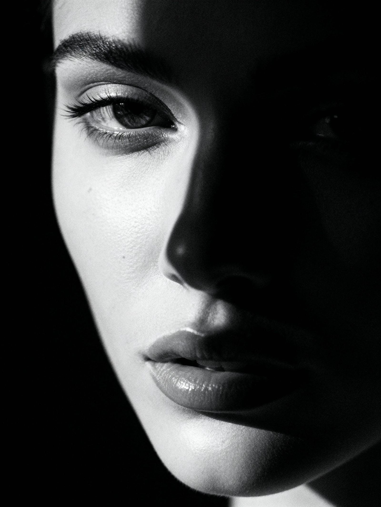 Sensual Top Model Portrait in Extreme Close-Up Darkness