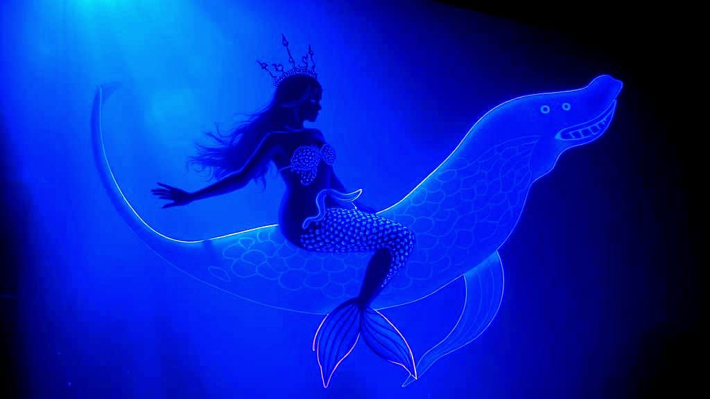 Vivid Fantasy Mermaid in Black-Light Neon Shadow Puppets Sty...