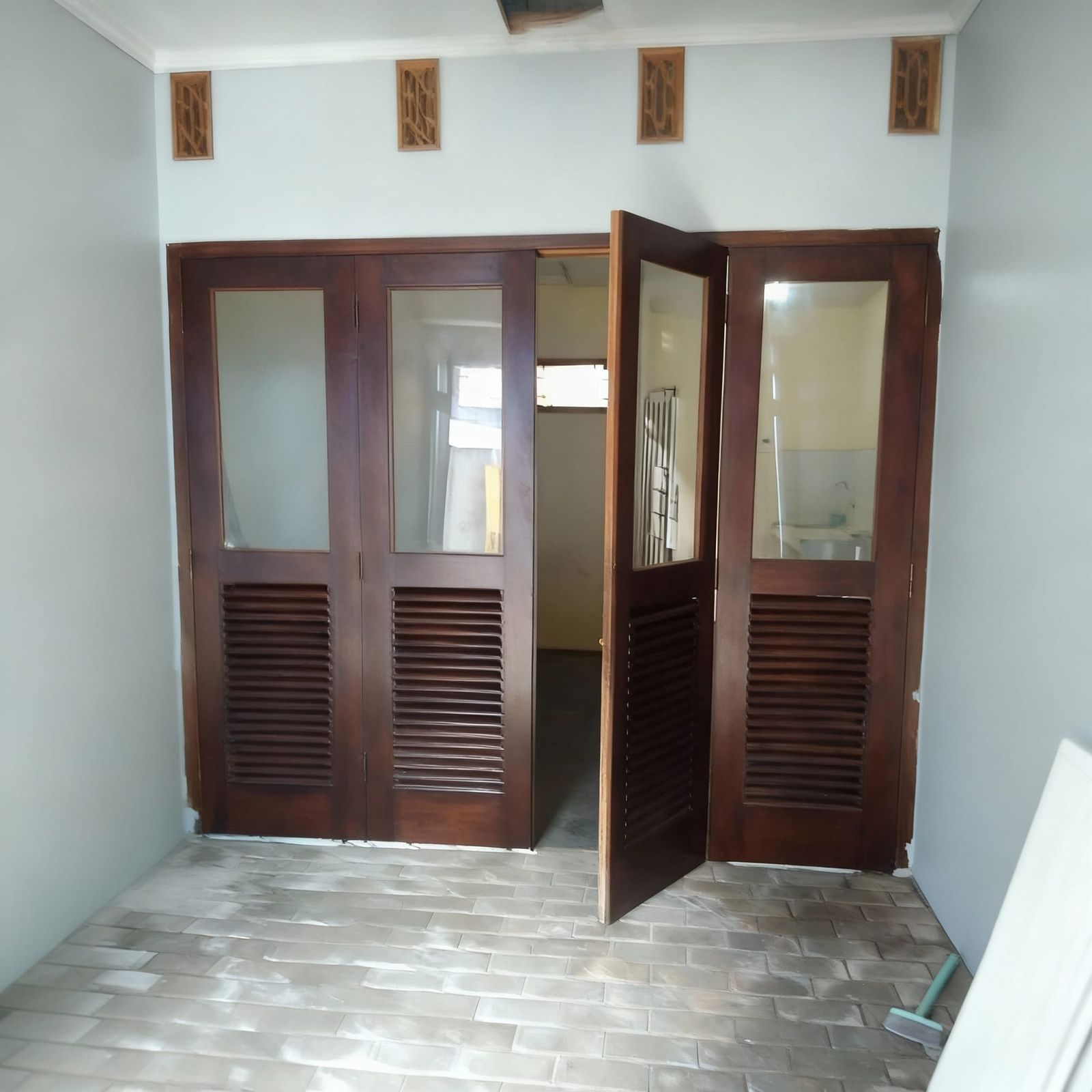 Freshly Painted Room Walls With Unchanged Door